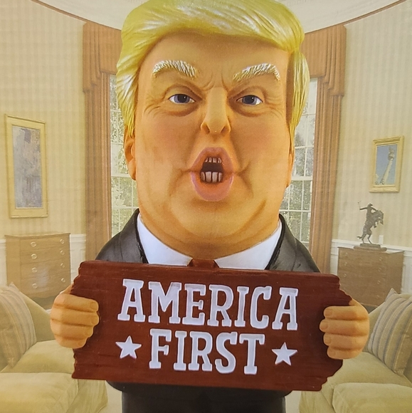 Donald Trump Holding "America First" Sign - Picture 1 of 5